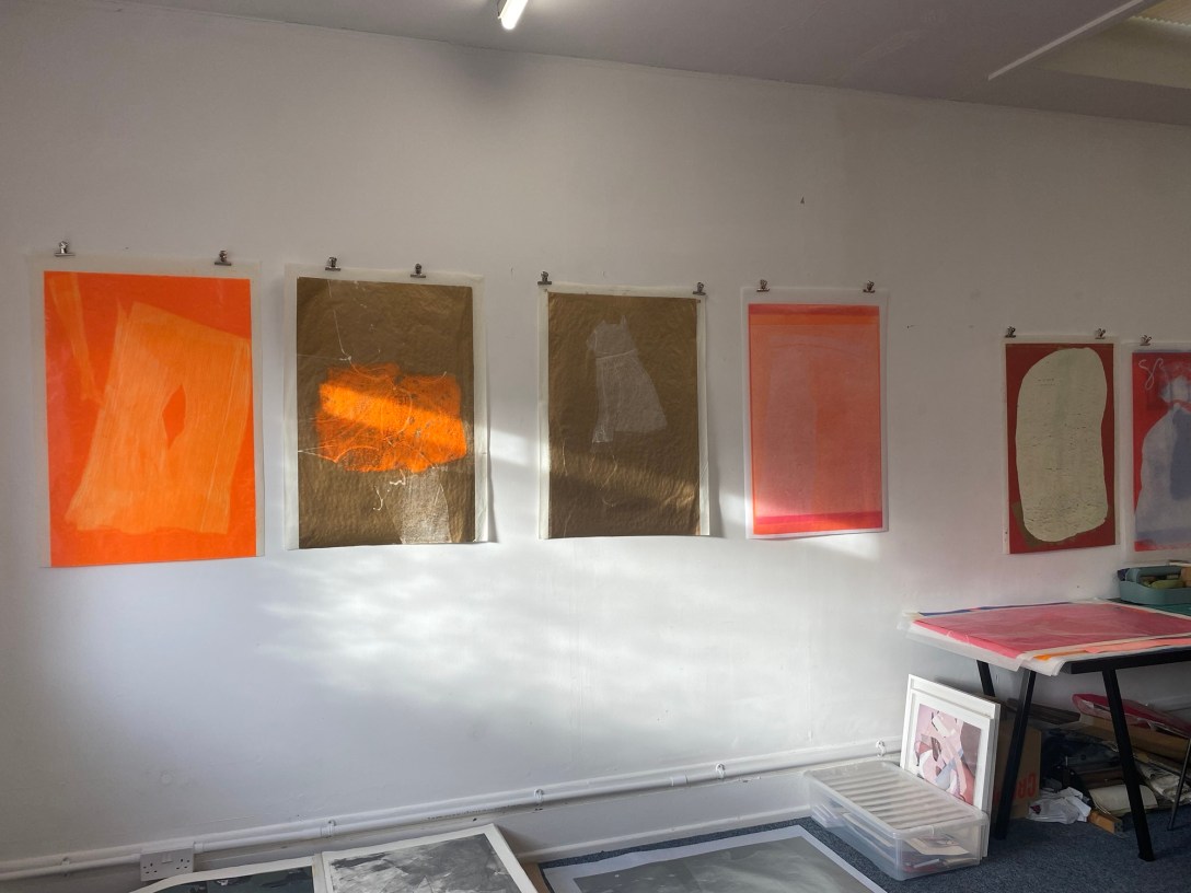 an image of Pauline's studio featuring images on her walls